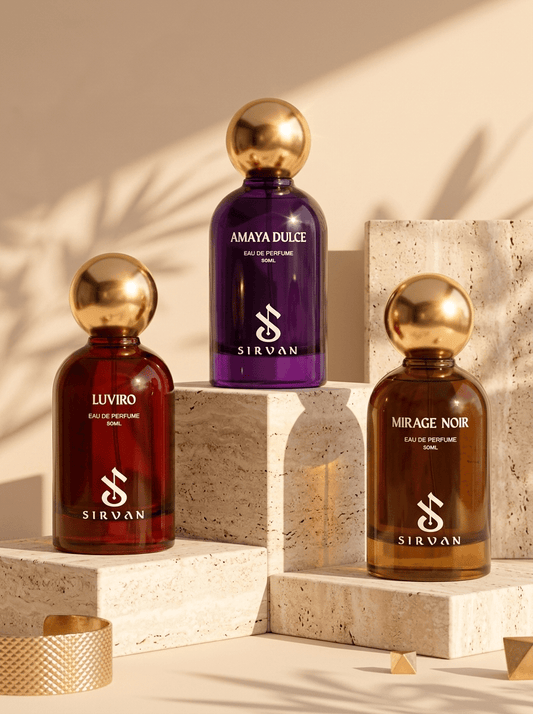 The Heritage Set by Sirvan Perfumes—Luviro, Amaya Dulce, and Mirage Noir—rests on beige stone blocks.